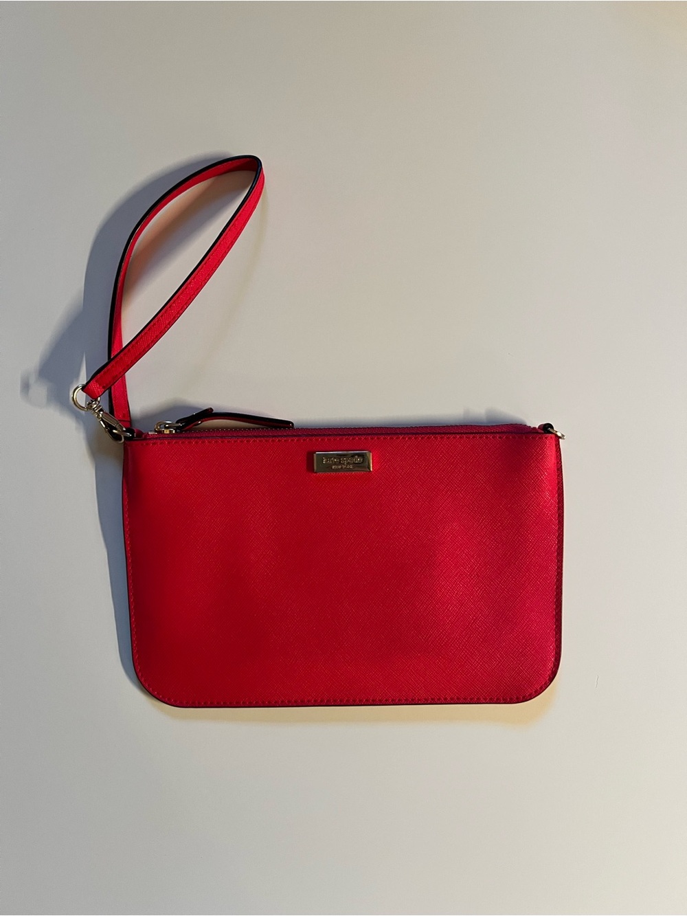 kate spade hot pink Wristlet with Gold Plaque